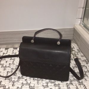 M. Fredric. This bag was made in Spain.